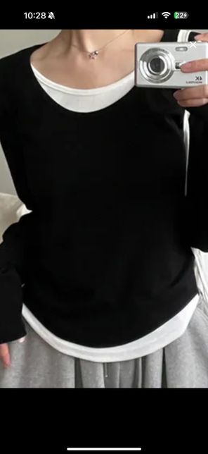 흰색과 검은색이 섞인 레이어티 새탁방법이 어떻게 되나요?의 0번 째 이미지