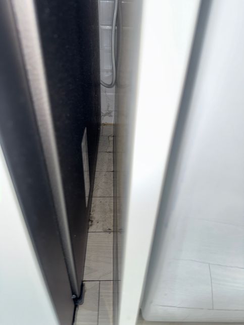 빌트인세탁기 왼쪽 밑 물이 고여있습니다..의 1번 째 이미지