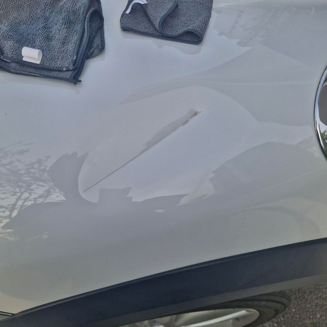 평행주차 연습하다가 긁힘 봐주세요.의 1번 째 이미지